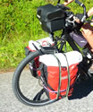 Bags ORTLIEB Rack Pack at the front with stabilization tensioner.